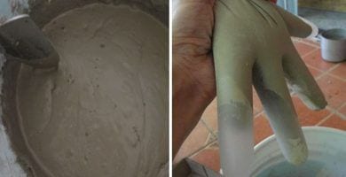manos cemento destacada