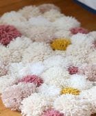 alfombra pompon